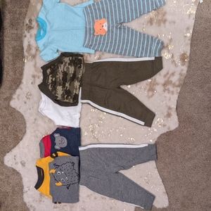 4 long sleeved onesies, 1 t-shirt, and three pairs of pants